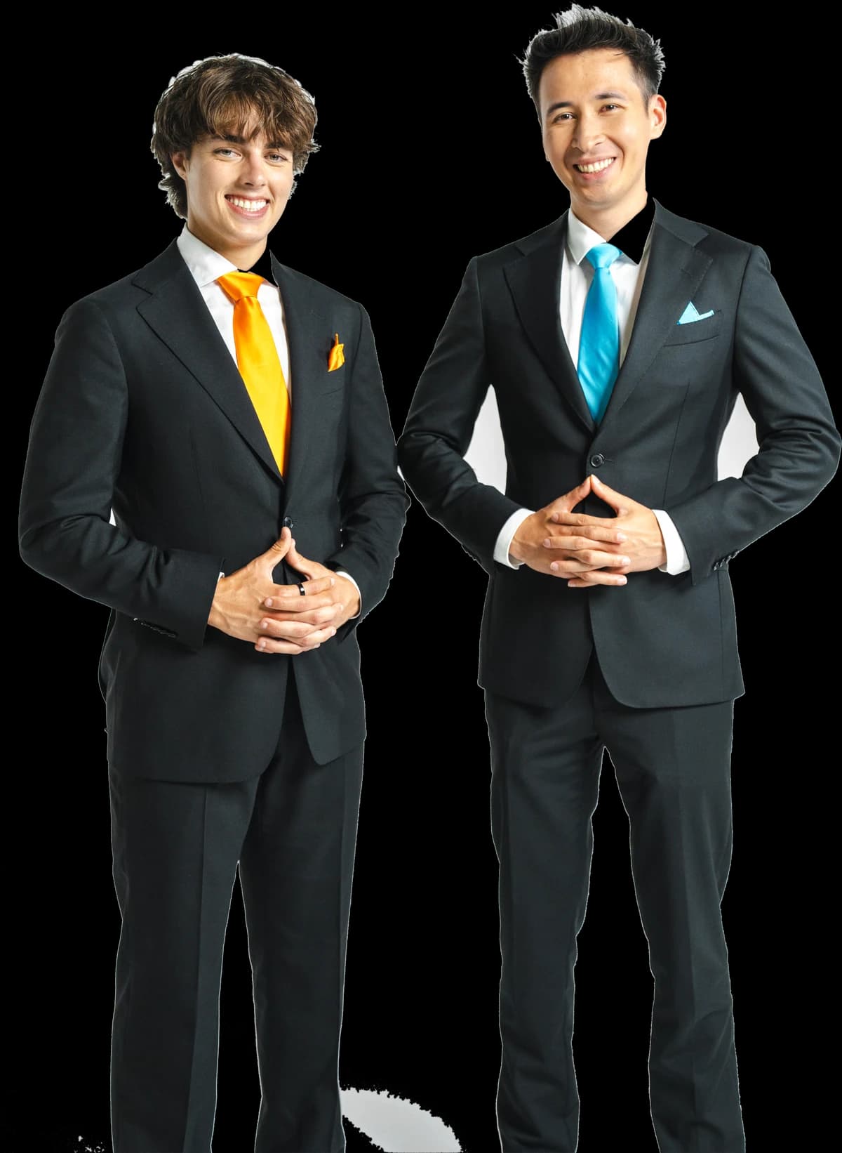 KingChris and Gianni Sirgy in black suits, orange and blue ties, standing side by side.